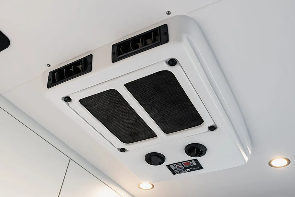 OutsideVan_Approach_InteriorHighlight_AirConditioner
